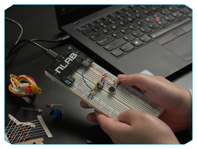 nLab board connected to a breadboard in front of a laptop