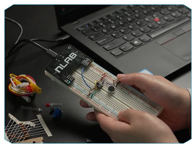 nLab board connected to a breadboard in front of a laptop